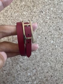Used Hermès Red and Purple Behapi reversible leather bracelet.